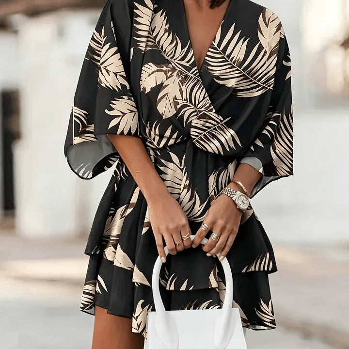 Rosanna | Flödande Batwing Wrap Klänning