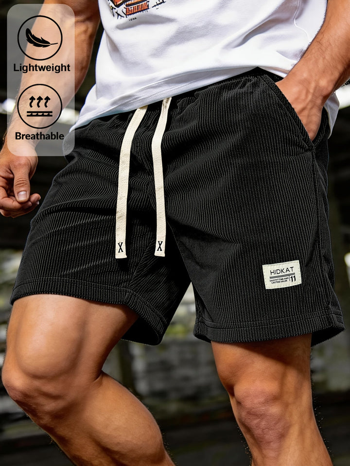 Preston | Avslappnade ribbade shorts med dragsko