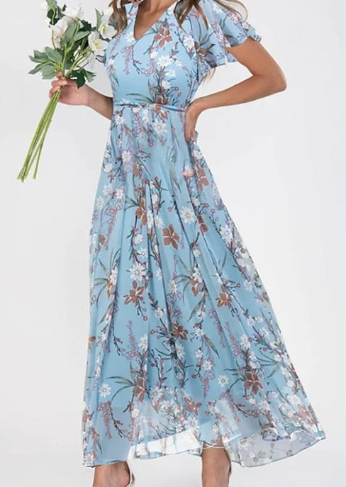 Lilia | Elegant blommig klänning med kort ärm