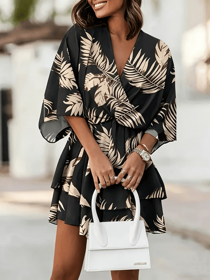Rosanna | Flödande Batwing Wrap Klänning