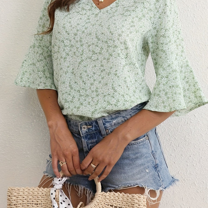 Lorraine | Blus med Blommig Volangärm