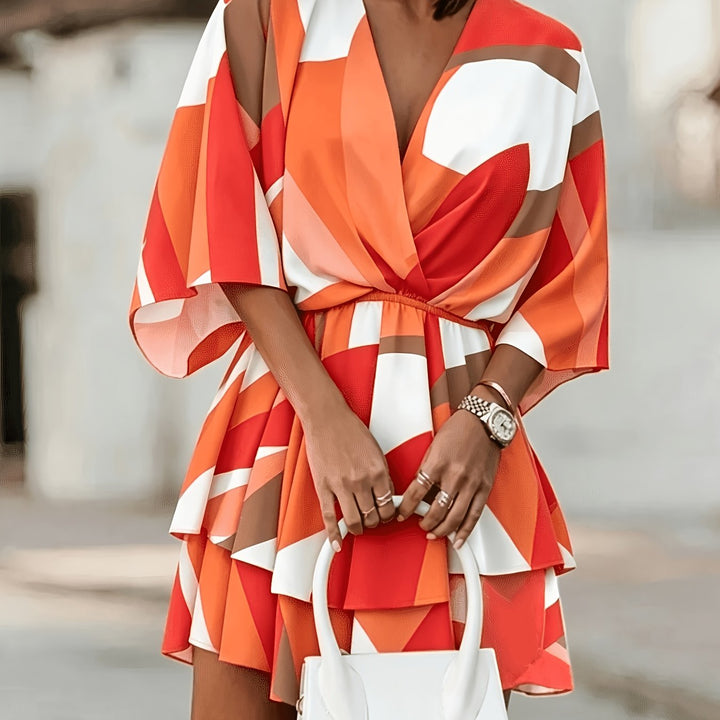 Rosanna | Flödande Batwing Wrap Klänning