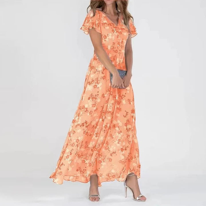 Lilia | Elegant blommig klänning med kort ärm