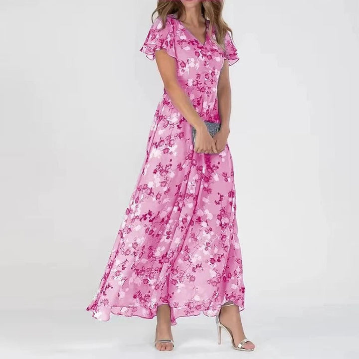 Lilia | Elegant blommig klänning med kort ärm