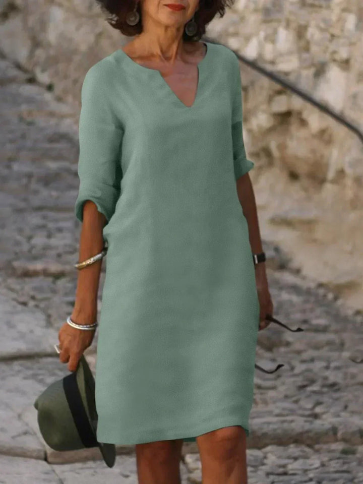 Harper | Elegant V-ringad Draperad Midi Klänning