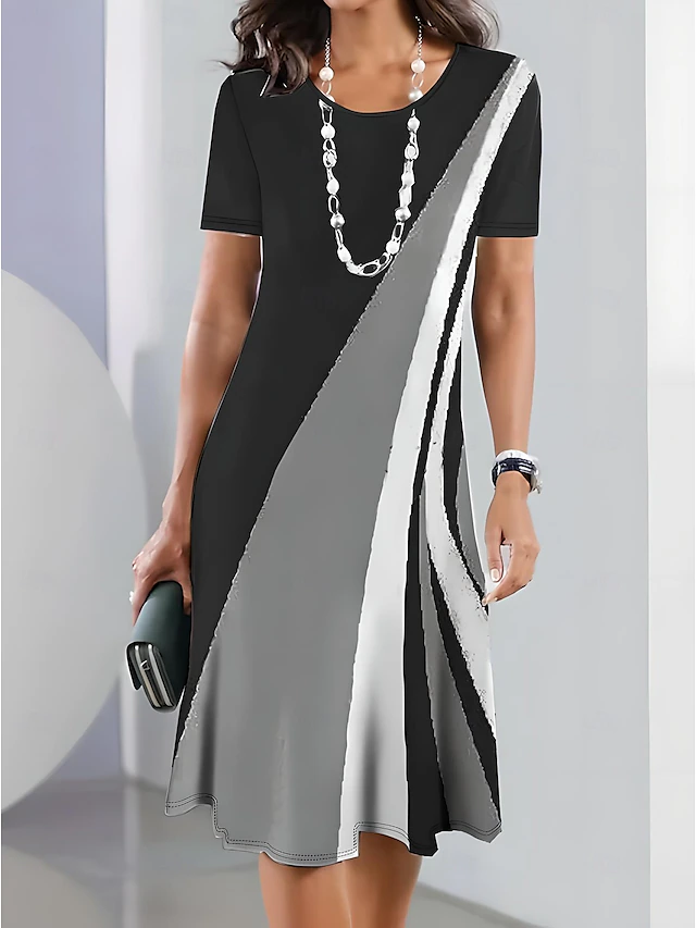 Tessa | Elegant Flödande Midi Klänning